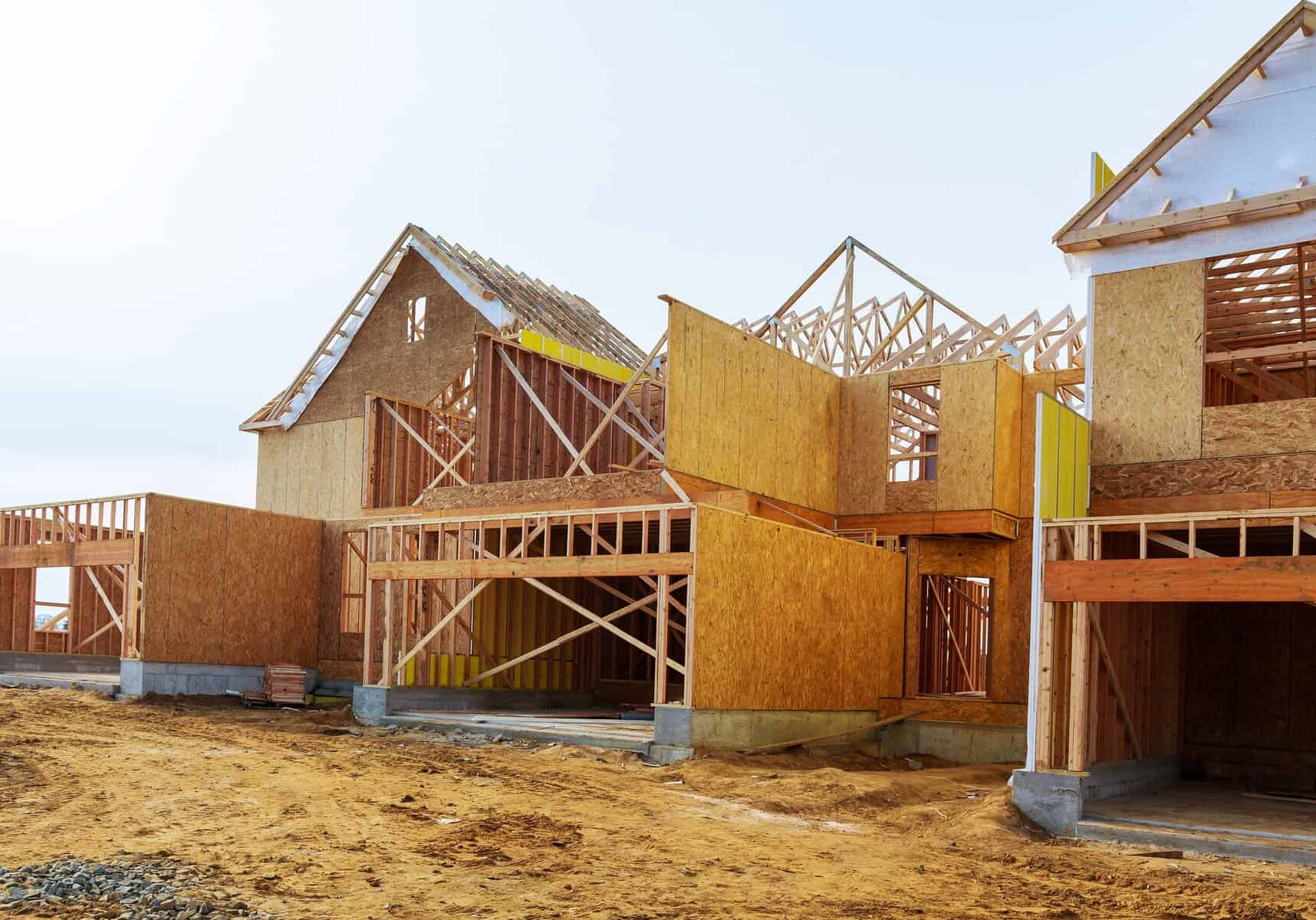 New construction of a house Framed New Construction of a House Building a new house wooden frame house construction